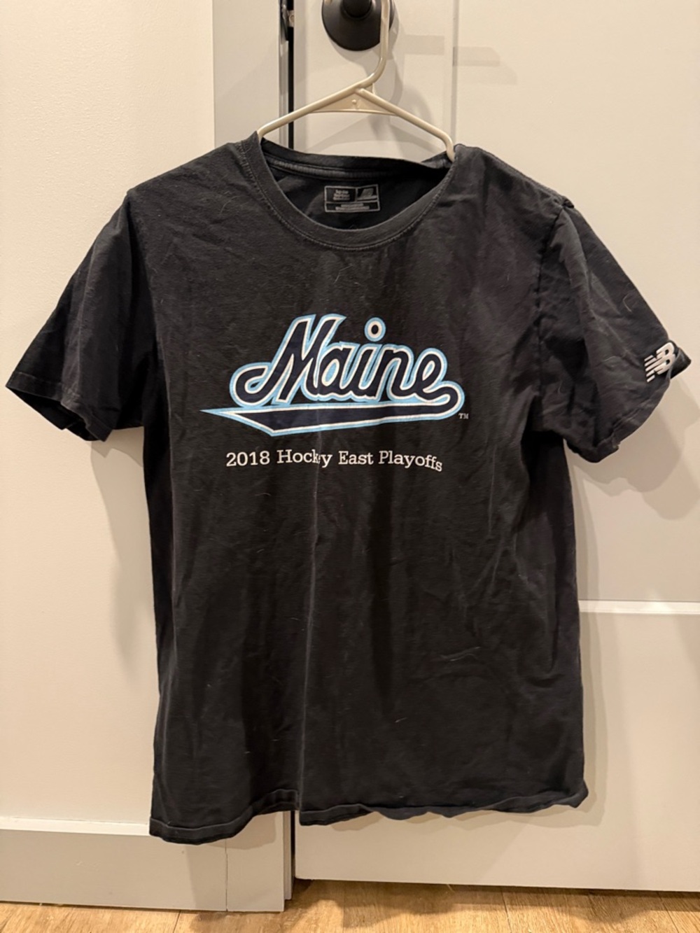 New Balance Black Graphic 'Maine' Short Sleeve Tee with Light Blue Accent